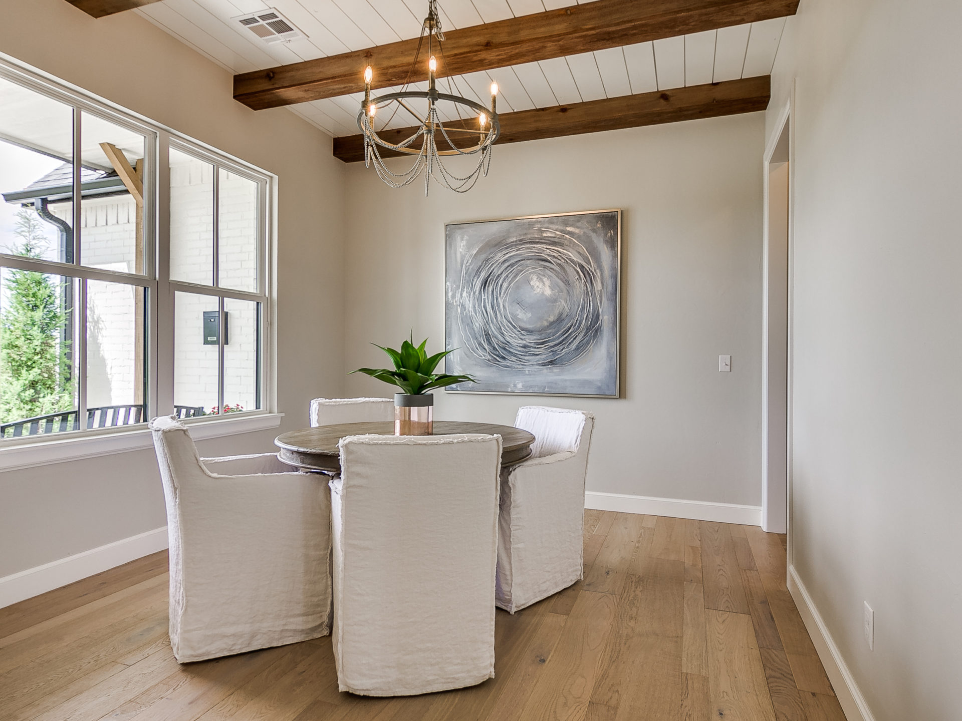 house interior, dining room with beams and big windows