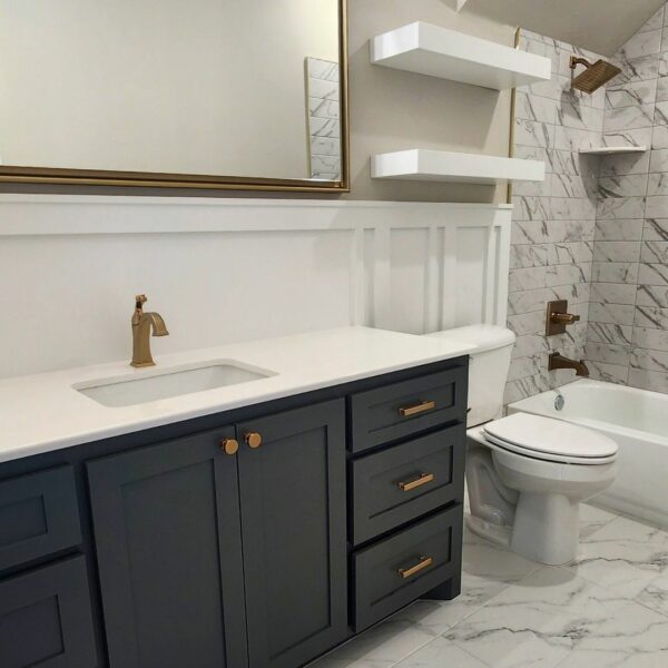 tub, powder bath, powder bathroom, bathroom design, bathroom tile, wainscoting, mirror, new construction, interior design, home for sale, homes in Norman, Norman OK