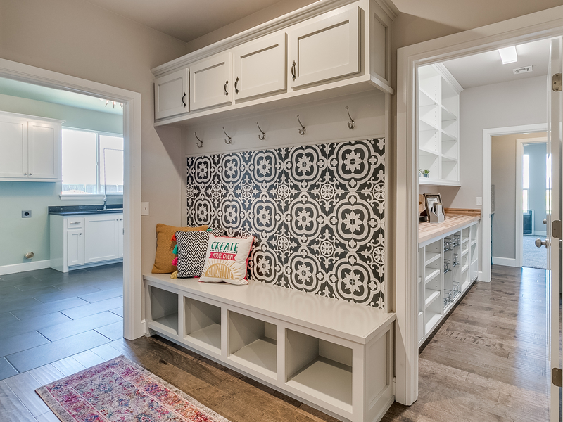 house interior, mudroom, built-in mudbench with tile