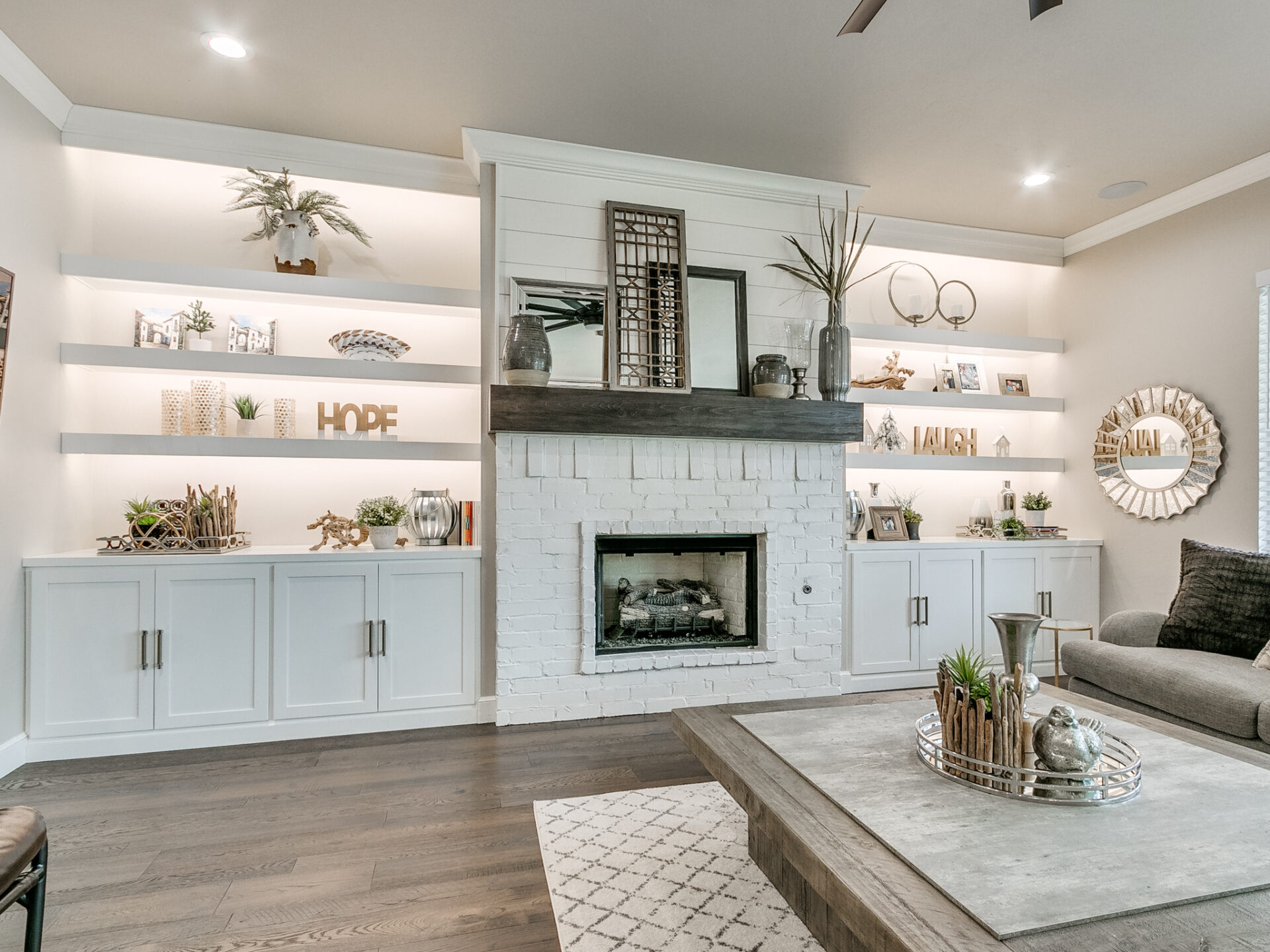 house interior, living room with modern fireplace and built-ins