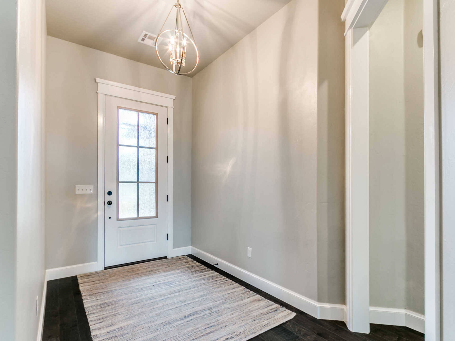 entryway, entry design, front door, interior design, lighting, new construction, interior design, homes in Norman, Norman OK