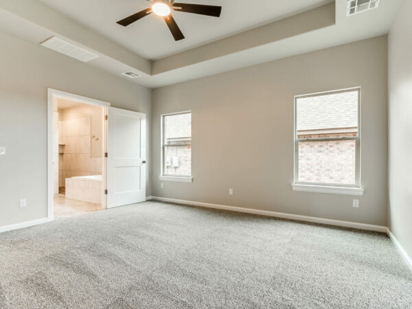 master bedroom, en-suite bath, tray ceiling, open concept, new construction, interior design, homes in Norman, Norman OK