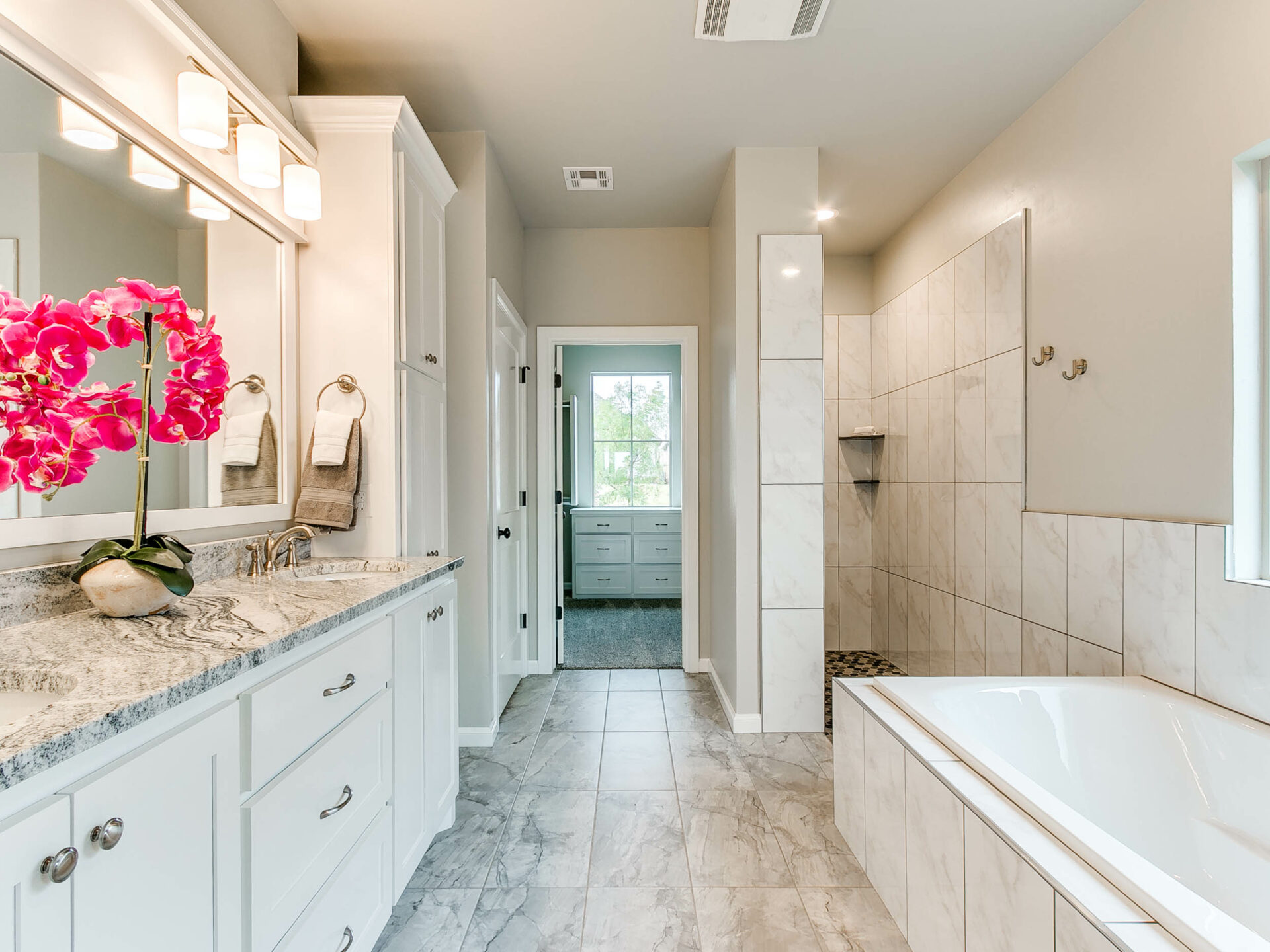 master bath, bathroom design, primary bath, tub, walk-in shower, shower tile, master bath design, walk-in closet, new construction, interior design, homes in Norman, Norman OK